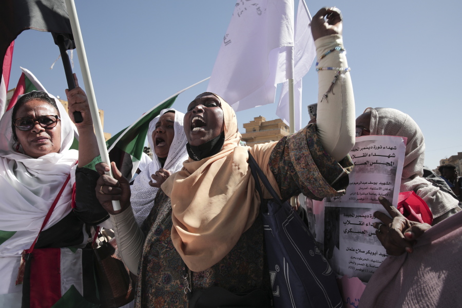 FILE - Sudanese demonstrators attend a rally to demand the return to civilian rule a year after a military coup, in Khartoum, Sudan, Nov. 17, 2022. Sudan's ruling generals and the main pro-democracy group signed a framework deal until elections on Monday, Dec. 5, 2022, but key dissenters have stayed out of the agreement. The deal pledges to establish a new, civilian-led transitional government to guide the country to elections and offers a path forward in the wake of Sudan's stalled transition to democracy following the October 2021 coup.