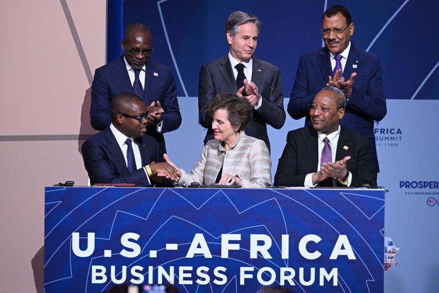 U.S. Secretary of State Antony Blinken, standing center, attends a Regional Compact Signing with the presidents of Benin, Patrice Talon, standing left, and Niger, Mohamed Bazoum, standing right, during the US-Africa Leaders Summit, Wednesday, Dec. 14, 2022 in Washington.