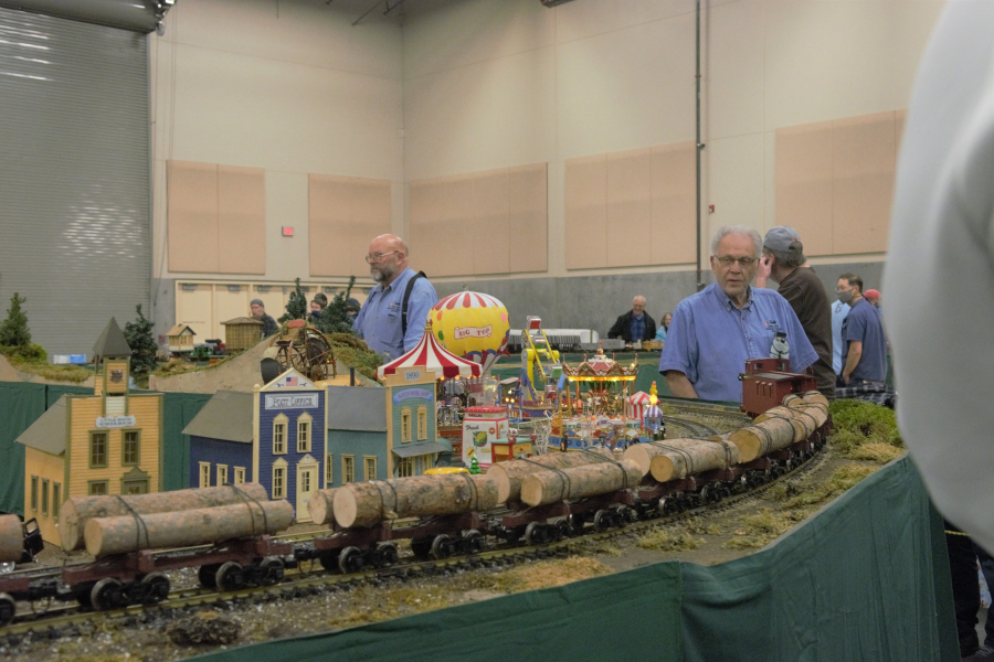 A model logging train winds around a display track assembled by the Rose City Garden Railway Society on Saturday during the Great Train Show at the Clark County Event Center. Dozens of vendors also filled the space, selling everything a model railroad enthusiast could need: engines, figurines, decals, books and anything else related to trains.