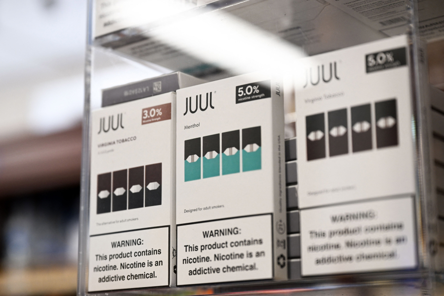 JUUL Labs Inc. Virginia tobacco and menthol flavored vaping e-cigarette products are displayed in a convenience store on June 23, 2022, in El Segundo, California. (Patrick T.