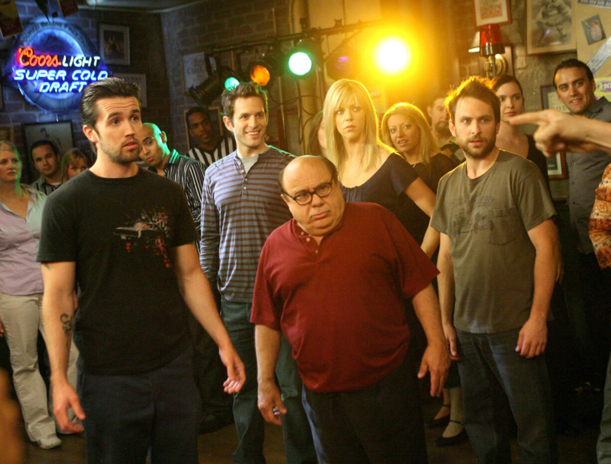 Rob McElhenney, from left, Glenn Howerton, Kaitlin Olson, Danny DeVito and Charlie Day act May 23, 2007 on the set of "It's Always Sunny In Philadelphia" in Los Angeles.