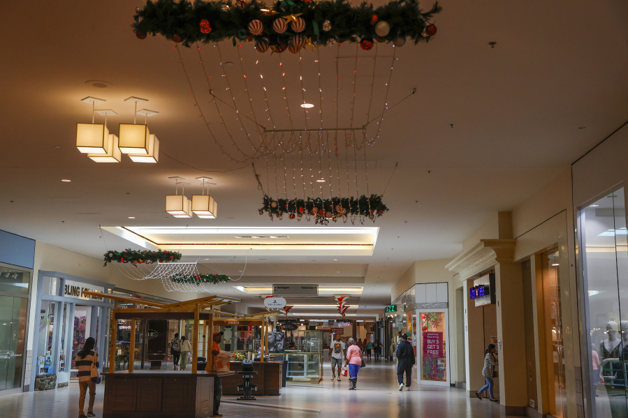 Shoppers roam University Mall in Tampa on Dec. 21, 2022.