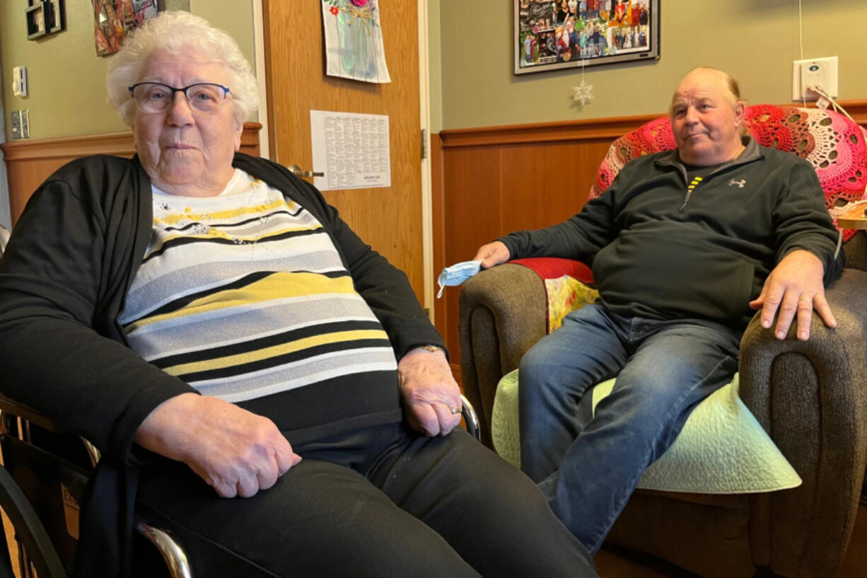 Marjorie Kruger visits with son Dan White in her new room at the Evangelical Lutheran Good Samaritan Society nursing home in Waukon, Iowa. Kruger transferred to the Waukon facility in September 2022, because Good Samaritan was closing its Postville, Iowa, home, where she lived for six years.