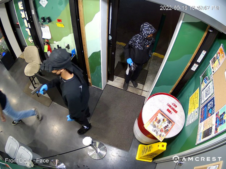 At left, two robbers are seen in this surveillance video captured at Sticky's Pot Shop in Hazel Dell in September. Armed robberies at cannabis retailers spiked statewide last year.