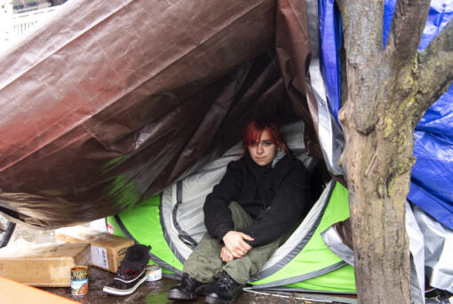 Angellina Ricker, 23, became homeless after aging out of the foster care system in Clark County. She now lives at a homeless encampment in downtown Vancouver in a tent she shares with her boyfriend.