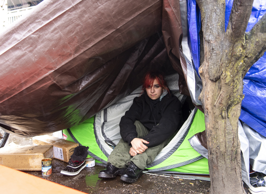 Angellina Ricker, 23, became homeless after aging out of the foster care system in Clark County. She now lives at a homeless encampment in downtown Vancouver in a tent she shares with her boyfriend.