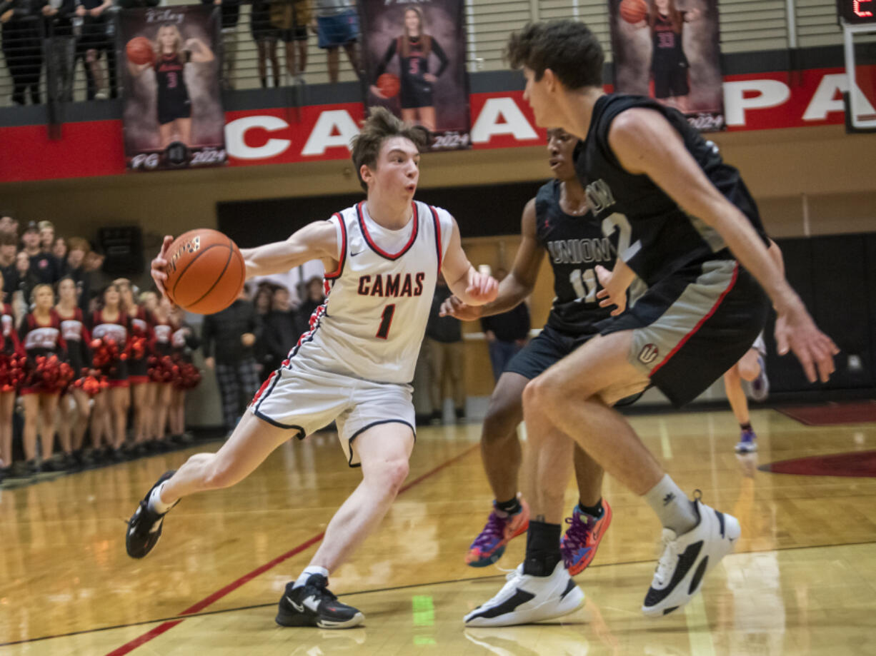 Camas sophomore Beckett Currie (1) plays in a basketball game Tuesday, Jan. 3, 2023, against Union at Camas High School.