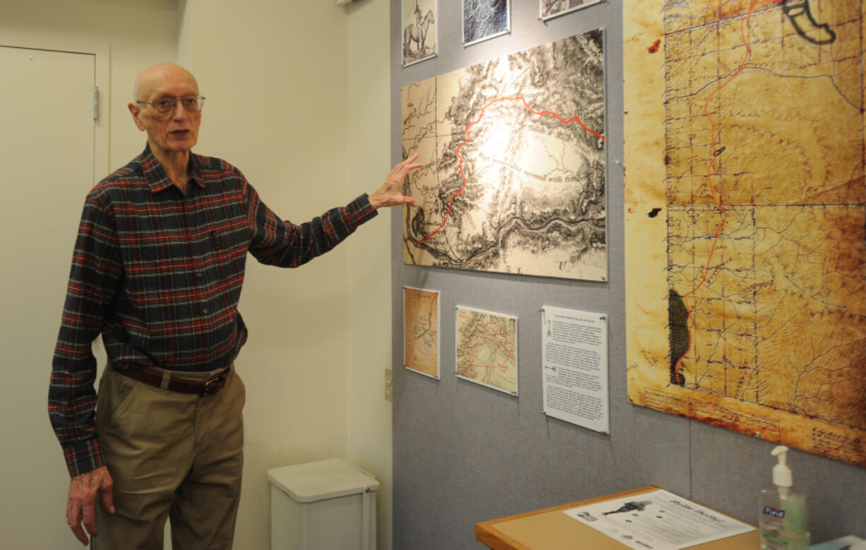 Battle Ground author Don Higgins explains how he found the many documents included in an exhibit about the city's history at the Battle Ground Community Library.