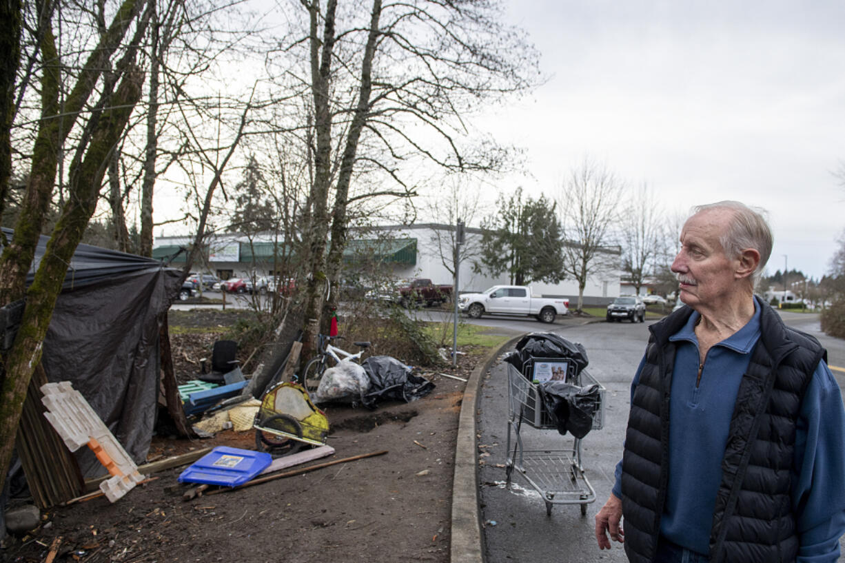 Tom Miller owns property next to a homeless encampment in Vancouver's North Image neighborhood called "The Swamps" by its residents. The Washington State Department of Transportation is trying to sell the land where The Swamps sits, meaning the camp will eventually be cleared and its residents will have to find a new home.