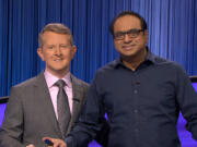 Vancouver resident Yogesh Raut, right, will appear on "Jeopardy!" hosted by Ken Jennings on Wednesday.