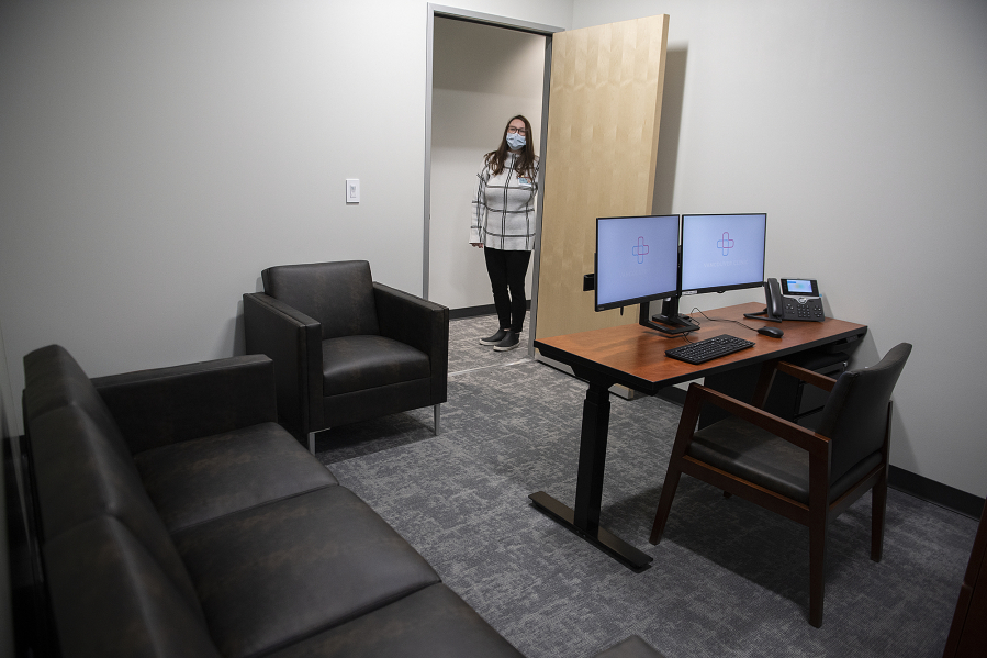 Stacey Regalado, clinic manager at the new Vancouver Clinic Mental Health Center, looks over one of the doctor's rooms. The facility, which is located in Salmon Creek Medical Center, is opening on Monday.