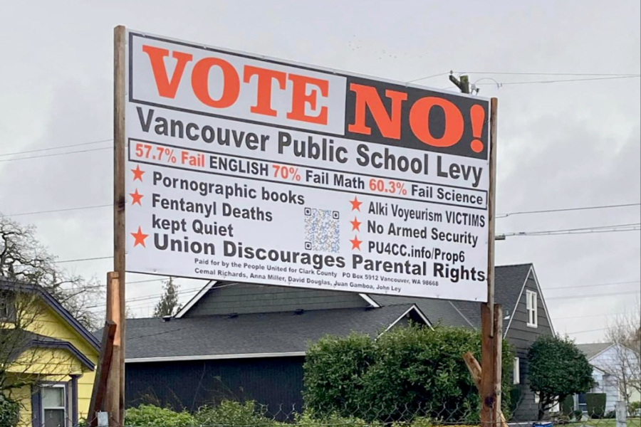 A sign posted by opponents of a replacement levy for Vancouver Public Schools says it was financed by People United for Clark County, a local right-wing political action committee.