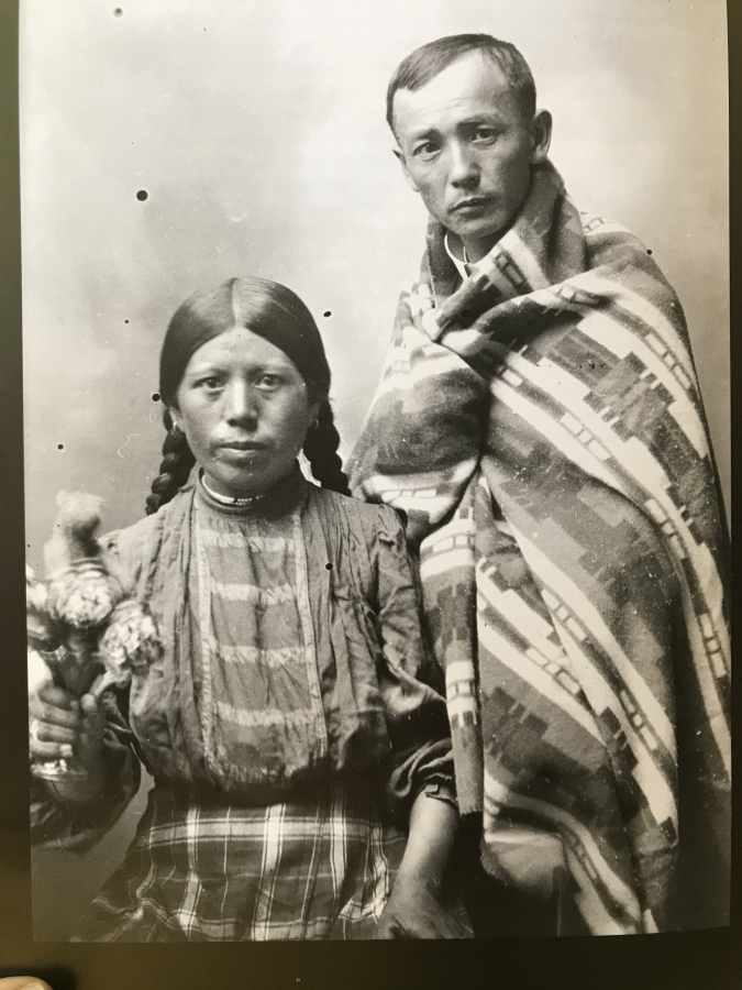 A woman named Susan Timento, right, with photographer Frank Matsura also assuming some tribal garb.