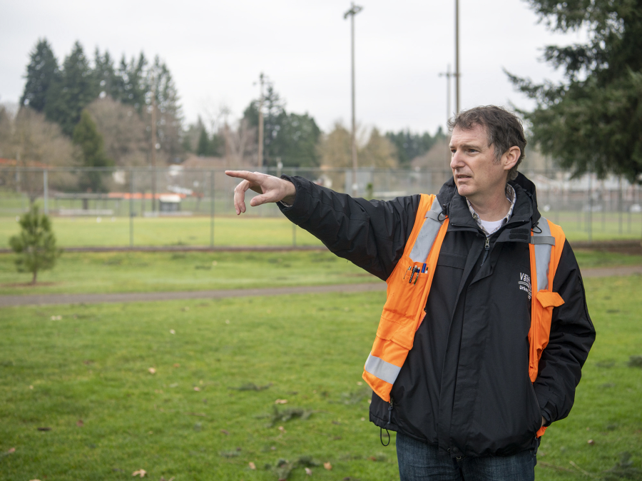 City of Vancouver urban forester Charles Ray talks about the benefits of trees Tuesday at Bagley Park. City officials are updating their urban forestry management plan to reflect changes in climate goals.