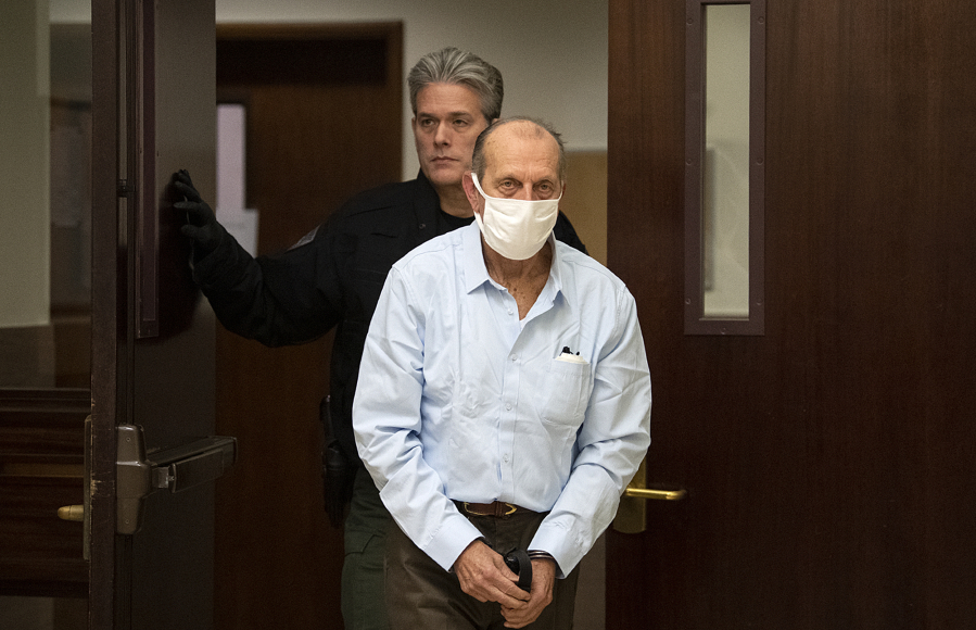 Suspected serial killer Warren Forrest leaves the courtroom after jury selection in his 1974 cold-case murder trial at the Clark County Courthouse on Tuesday morning.