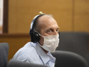Suspected serial killer Warren Forrest listens during his cold-case murder trial at the Clark County Courthouse on Tuesday.