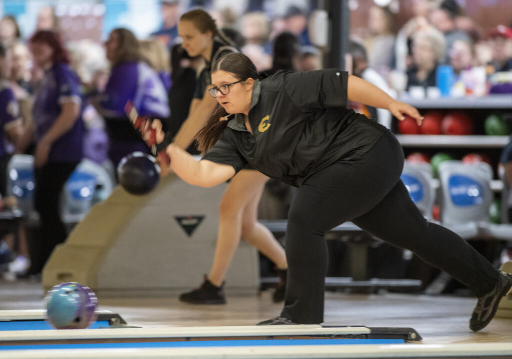 Evergreen senior Kierra Wilcox bowls Friday, Jan. 27, 2023, during the 4A/3A District Bowling Tournament at Husted’s Hazel Dell Lanes.