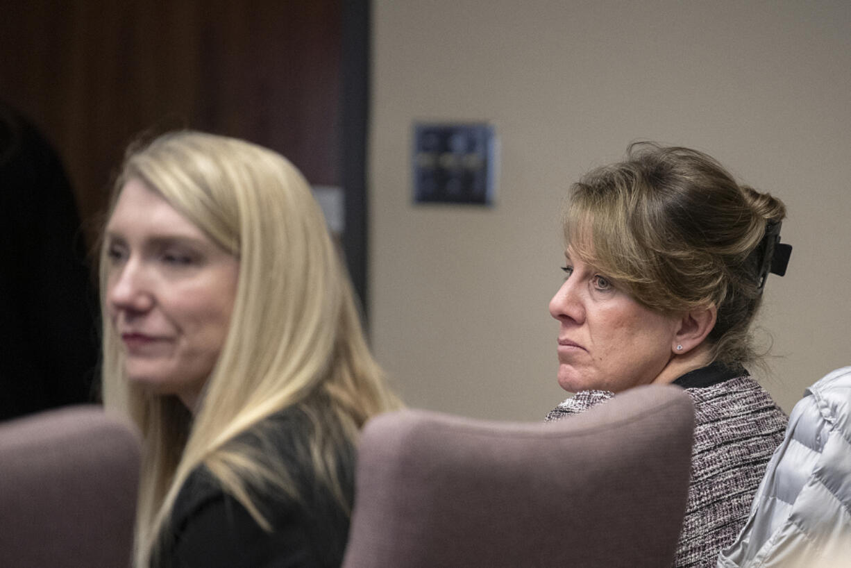 Defense attorney Jacy Thayer, left, sits with defendant Stephanie "Sam" Westby at the opening of Westby's murder trial Monday at the Clark County Courthouse. Westby is accused of killing her husband during a confrontation over him having an extramarital affair.