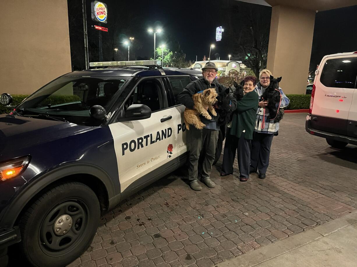 Four show dogs are returned to their owners Sunday after being stolen from a Portland hotel on Saturday.