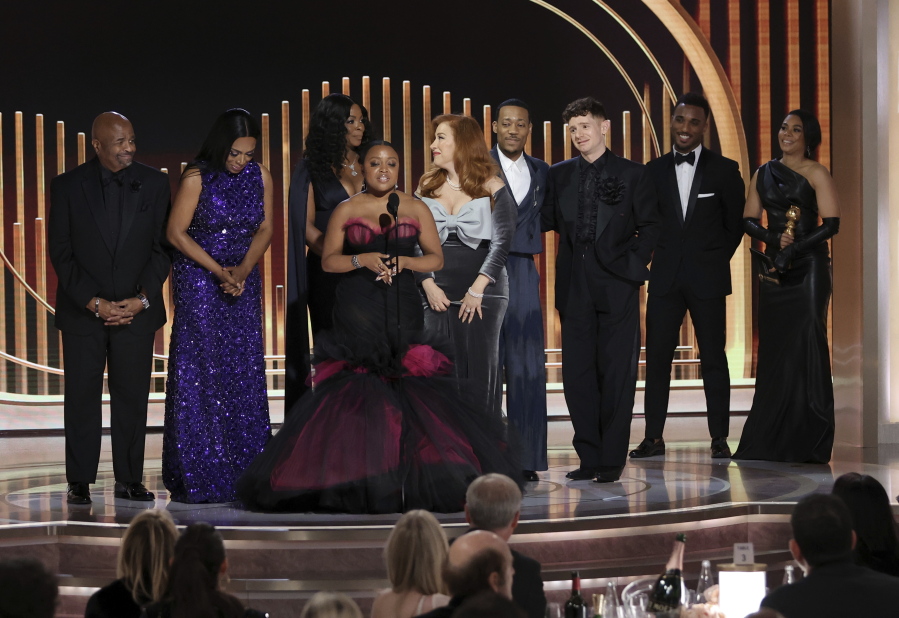 This image released by NBC shows Quinta Brunson, foreground, and the cast of "Abbott Elementary" accepting the award for Best Television Series - Comedy during the 80th Annual Golden Globe Awards at the Beverly Hilton Hotel on Tuesday, Jan. 10, 2023, in Beverly Hills, Calif.