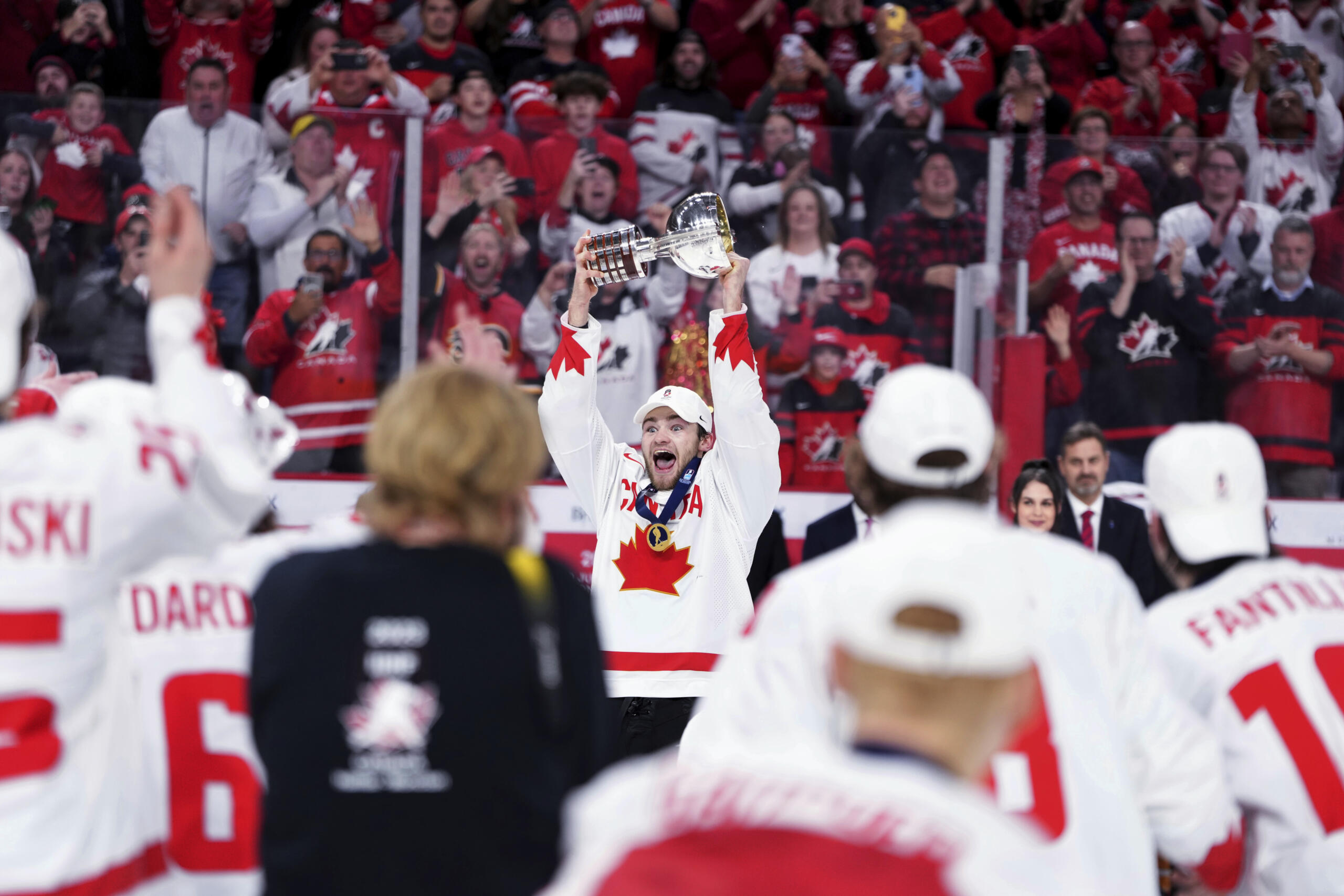 Canada's Shane Wright lifts the Championship Cup after Canada defeated Czechia in overtime during the title game in the IIHF world junior hockey championships Thursday, Jan. 5, 2023, in Halifax, Nova Scotia.