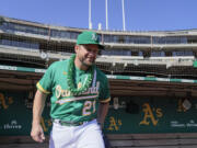 Retired catcher Stephen Vogt is joining the Seattle Mariners as a bullpen and quality control coach, fulfilling his goal to go right into coaching. The 38-year-old Vogt called it a career after his 10th major league season in 2022. (AP Photo/Godofredo A.