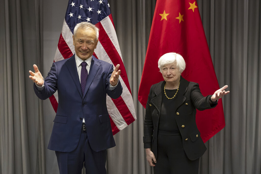 Treasury Secretary Janet Yellen, right, shakes hands with China's Vice-Premier Liu He during a bilateral meeting in Zurich, Switzerland on Wednesday, Jan. 18, 2023.