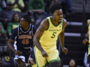 Oregon guard Jermaine Couisnard (5) reacts after making a shot against against Arizona during the second half of an NCAA college basketball game Saturday, Jan. 14, 2023, in Eugene, Ore.