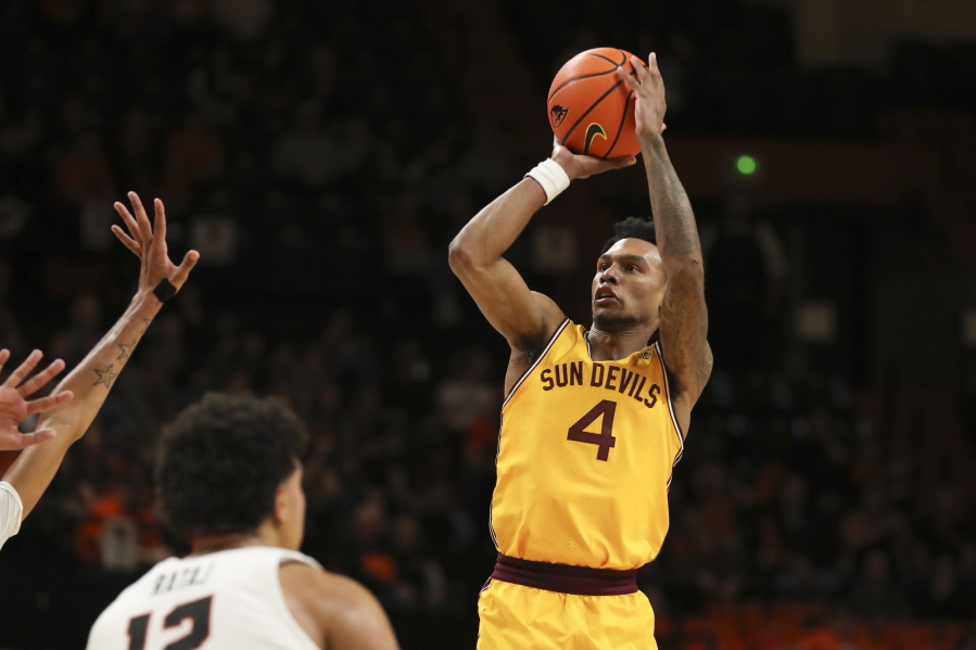 Arizona State guard Desmond Cambridge Jr. (4) looks to shoot a 3-point basket against Oregon State during the second half of an NCAA college basketball game in Corvallis, Ore., Saturday, Jan. 14, 2023.