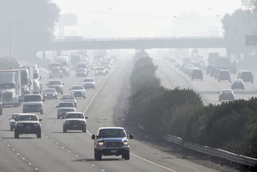 Traffic moves along along 99 south in Fresno, Calif., Dec. 28, 2017. Fresno displaced Fairbanks, Alaska as the metropolitan area with the worst short-term particle pollution, a 2022 report by the American Lung Association found, while Bakersfield, Calif., continued in the most-polluted slot for year-round particle pollution for the third year in a row.