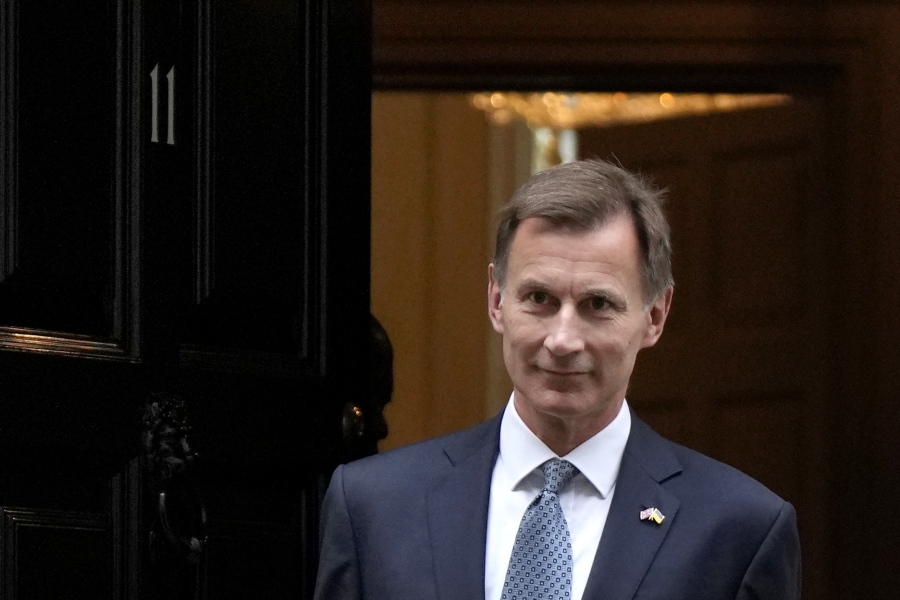 FILE - Britain's Chancellor Jeremy Hunt leaves 11 Downing Street to attend Parliament in London, Thursday, Nov. 17, 2022. Britain's Treasury chief said Friday, Jan. 27, 2023, that taming inflation is more important than cutting taxes, resisting calls from some in the governing Conservative Party for immediate tax breaks for businesses and voters.