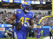 Los Angeles Rams linebacker Bobby Wagner celebrates after an interception during the first half of an NFL football game between the Los Angeles Rams and the Denver Broncos on Sunday, Dec. 25, 2022, in Inglewood, Calif. (AP Photo/Marcio J.