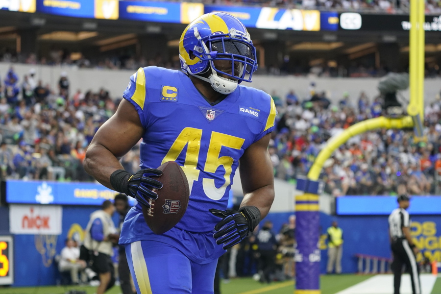 Los Angeles Rams linebacker Bobby Wagner celebrates after an interception during the first half of an NFL football game between the Los Angeles Rams and the Denver Broncos on Sunday, Dec. 25, 2022, in Inglewood, Calif. (AP Photo/Marcio J.