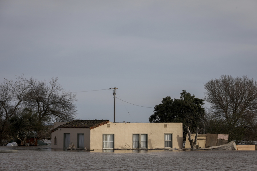 A home sits in floodwaters in Salinas, Calif. on Thursday, Jan. 12, 2023.