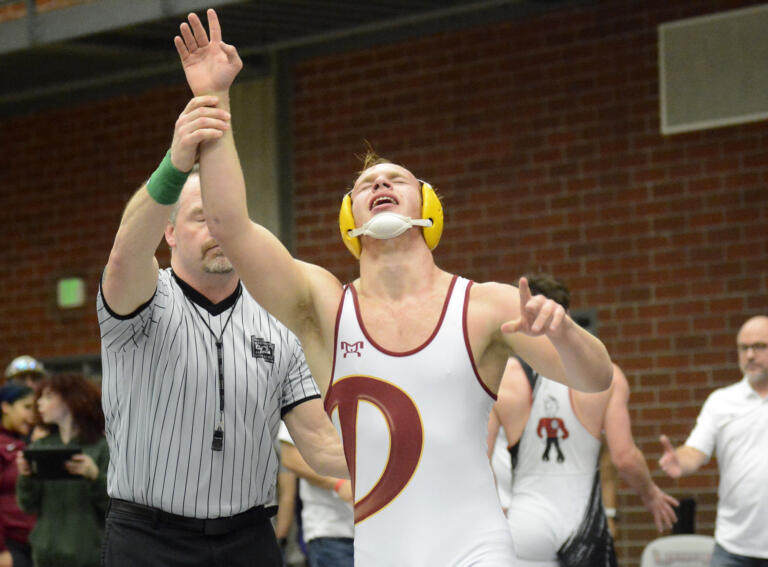 Prairie's Seth Blick celebrates after winning the boys 195-pound championship match at the Clark County Wrestling Championships at Union High School on Saturday, Jan.