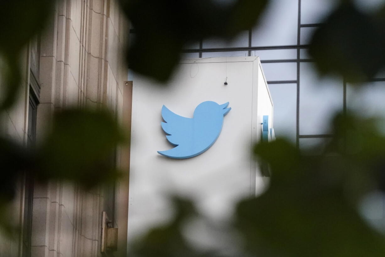 FILE - A sign at Twitter headquarters is shown in San Francisco, Dec. 8, 2022. The House Oversight Committee is set to hear testimony from former Twitter employees involved in the social media platform's handling of reporting on President Joe Biden's son Hunter. The committee confirmed Monday that the former Twitter employees will testify at a hearing next week.