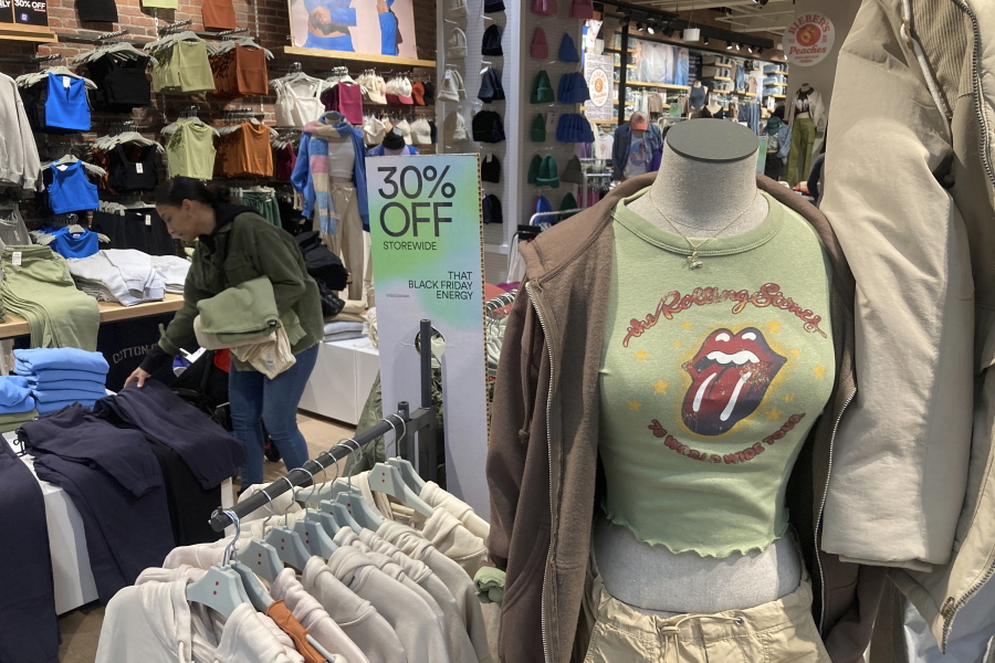 FILE - A Rolling Stones t-shirt from 1970 is displayed in the Westfield Garden State Plaza shopping mall in Paramus, New Jersey, on Saturday, December 17, 2022. On Thursday, the Labor Department reports on U.S. consumer prices for December.