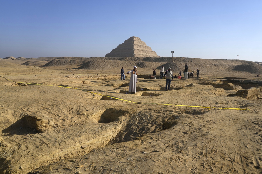 Egyptian antiquities workers dig at the site of the Step Pyramid of Djoser in Saqqara, 24 kilometers (15 miles) southwest of Cairo, Egypt, Thursday, Jan. 26, 2023. Egyptian archaeologist Zahi Hawass, the director of the Egyptian excavation team, announced that the expedition found a group of Old Kingdom tombs dating to the fifth and sixth dynasties of the Old Kingdom, indicating that the site comprised a large cemetery.