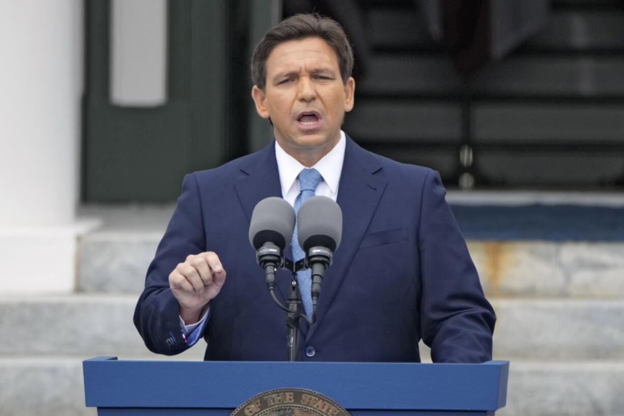 FILE - Florida Gov. Ron DeSantis speaks after being sworn in to begin his second term during an inauguration ceremony outside the Old Capitol on Jan. 3, 2023, in Tallahassee, Fla. DeSantis has adopted a more cautious approach as as thousands of Cuban migrants flocked to Florida in recent weeks. The governor, who is a top Republican presidential prospect, activated the National Guard late last week.