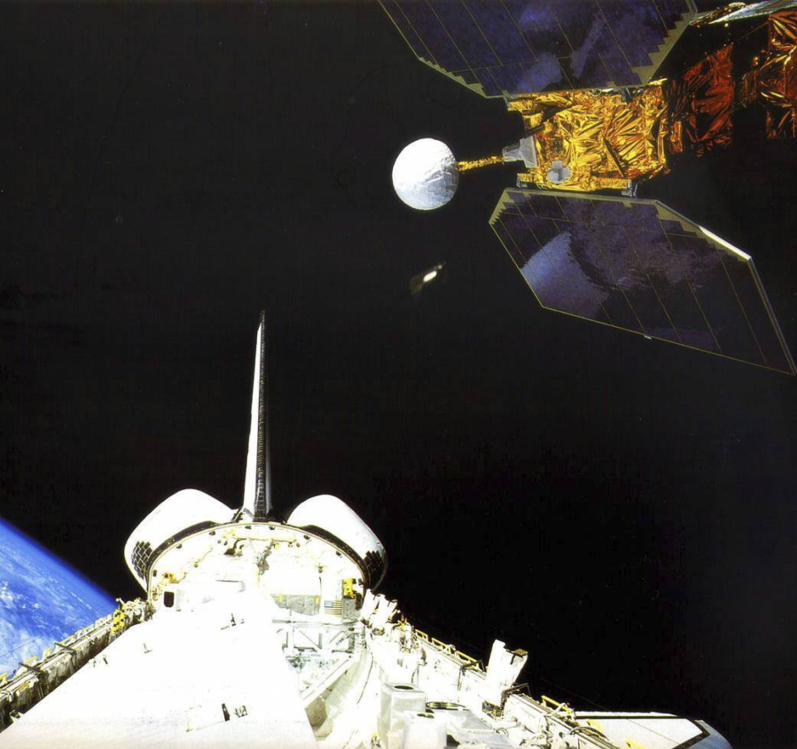In this photo made available by NASA, the space shuttle Challenger launches the Earth Radiation Budget Satellite in 1984. On Friday, Jan. 6, 2023, the U.S. space agency said the 38-year-old NASA satellite is about to fall from the sky, but the chance of wreckage falling on anybody is "very low." It's expected to come down Sunday night, give or take 17 hours.