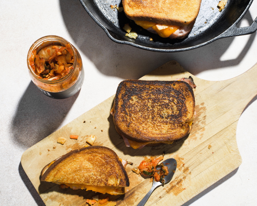 This image released by Milk Street shows a recipe for Kimchi Grilled Cheese with Ham.