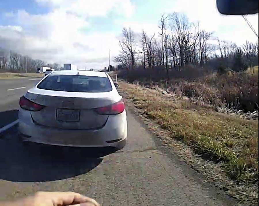 In this image from a bodycam video provided by the Hancock County Sheriff's Office, a white Hyundai Elantra occupied by Bryan Kohberger and his father is seen on a deputy's body camera video during a traffic stop on Thursday, Dec. 15, 2022, in Hancock County, Ind. Bryan Kohberger, accused in the November slayings of four University of Idaho students, had a first court appearance on Jan. 5, 2023 in Latah County Court in Moscow, Idaho on first-degree murder charges.