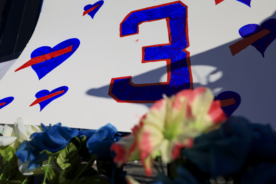 A sign with the number of Buffalo Bills' Damar Hamlin is seen for the display set-up outside of University of Cincinnati Medical Center, Wednesday, Jan. 4, 2023, in Cincinnati. Hamlin was taken to the hospital after collapsing on the field during the Bill's NFL football game against the Cincinnati Bengals on Monday night.