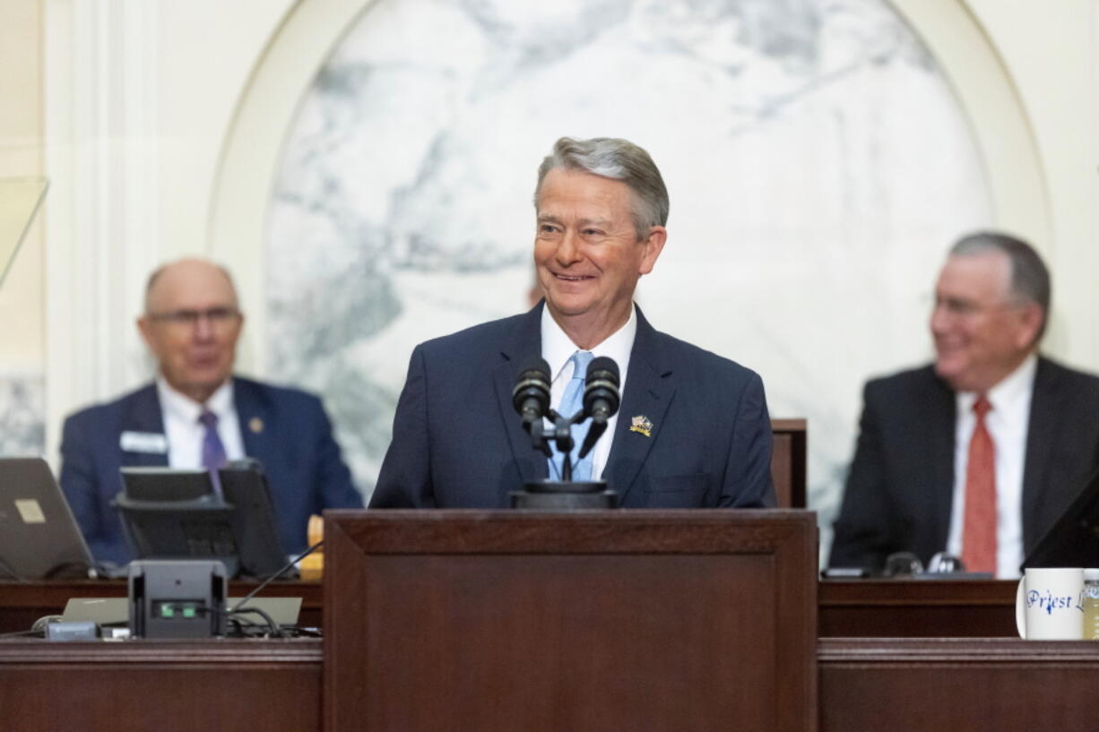 Idaho Gov. Brad Little claps delivers his 2023 State of the State address held at the Idaho State Capitol, Monday, Jan. 9, 2023, in Boise, Idaho.