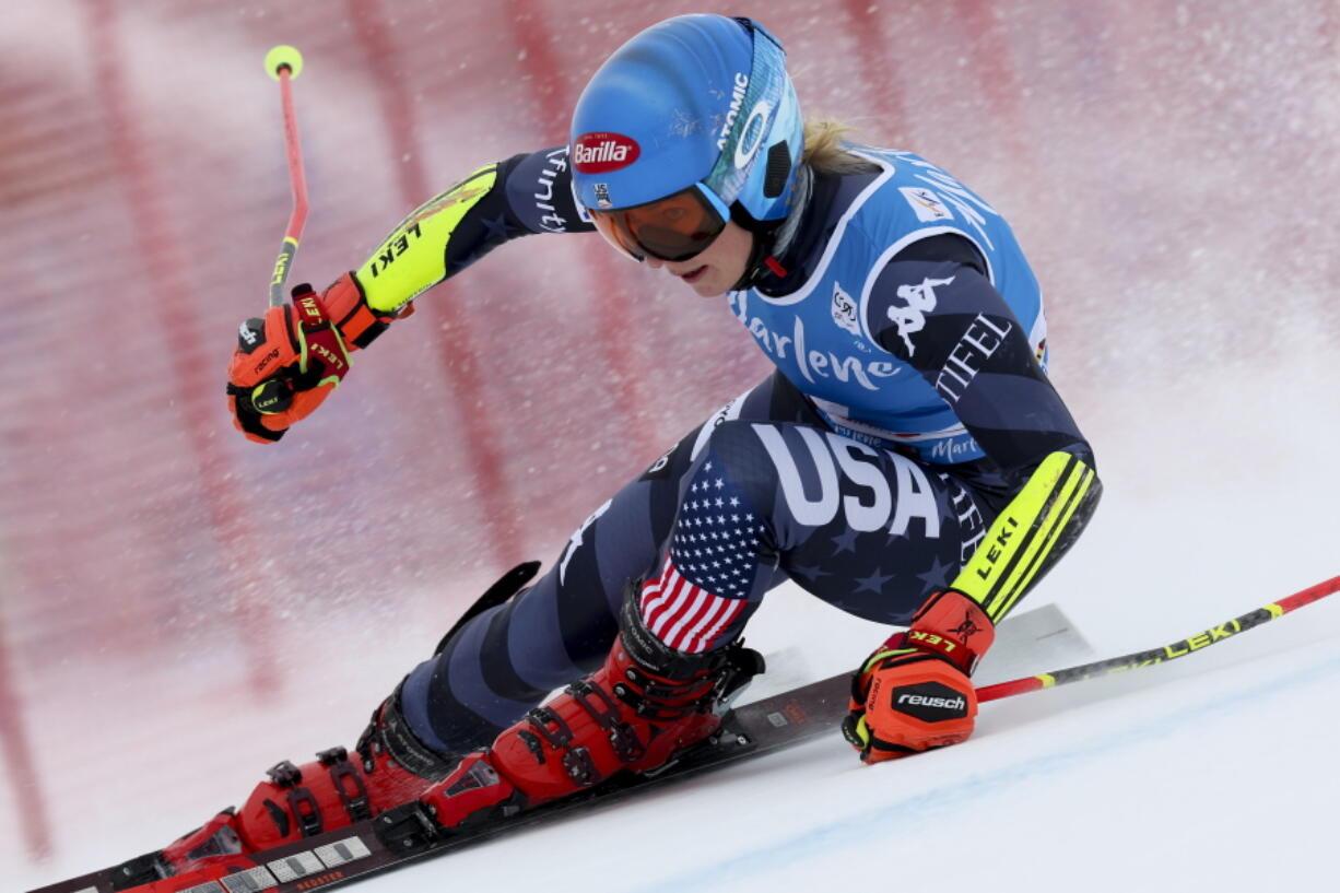 United States' Mikaela Shiffrin speeds down the course during an alpine ski, women's World Cup giant slalom, in Kronplatz, Italy, Tuesday, Jan. 24, 2023.