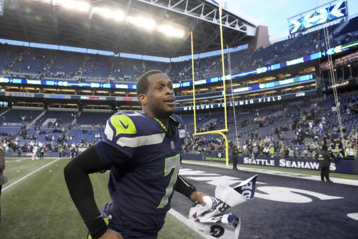 Seattle Seahawks quarterback Geno Smith (7) leaves the field after an NFL football game against the New York Jets, Sunday, Jan. 1, 2023, in Seattle. The Seahawks defeated the Jets 23-6. (AP Photo/Ted S.