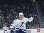 Tampa Bay Lightning forward Corey Perry celebrates after scoring a goal during the first period of an NHL hockey game against the Seattle Kraken, Monday, Jan. 16, 2023, in Seattle.