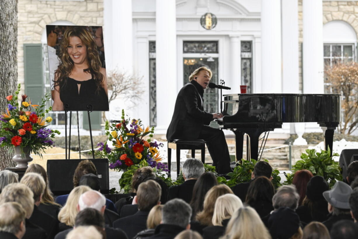 Axl Rose performs during a memorial service for Lisa Marie Presley Sunday, Jan. 22, 2023, in Memphis, Tenn. She died Jan. 12 after being hospitalized for a medical emergency and was buried on the property next to her son Benjamin Keough, and near her father Elvis Presley and his two parents.