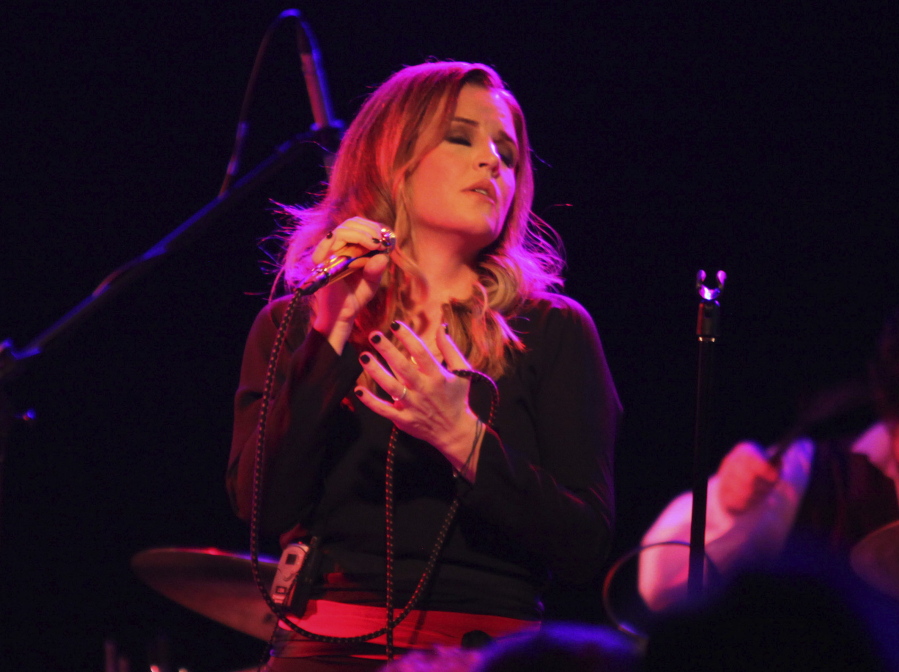 Lisa Marie Presley performs during her Storm & Grace tour on June 20, 2012, at the Bottom Lounge in Chicago. She was dubbed a "rock princess," but Lisa Marie Presley staked her own musical claim as a singer-songwriter, allowing her to express herself apart, but sometimes alongside, from her iconic lineage.