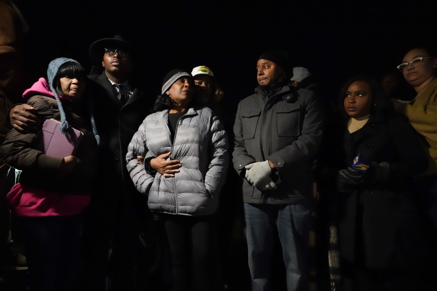 RowVaughn Wells, center, mother of Tyre Nichols, who died after being beaten by Memphis police officers, is comforted by his stepfather Rodney Wells, at the conclusion of a candlelight vigil for Tyre, in Memphis, Tenn., Thursday, Jan. 26, 2023.